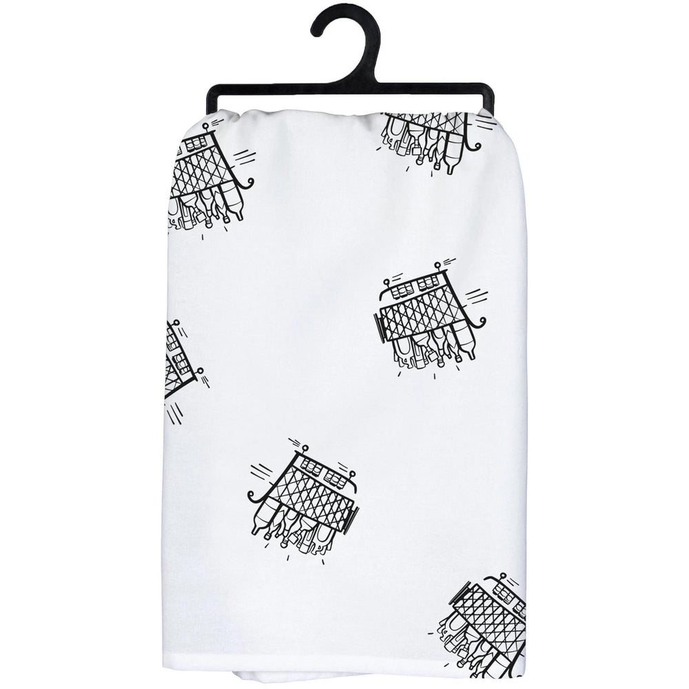 White towel with black geometric pattern on a hanger
