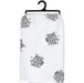 White towel with black geometric pattern on a hanger