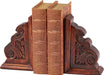 Wooden bookends with ornate carvings on a white background