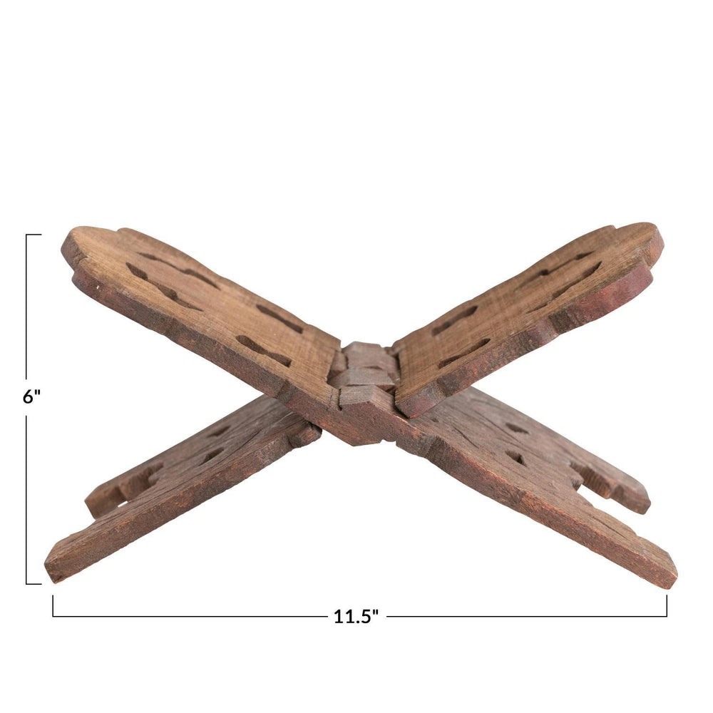 Wooden cross-shaped object with dimensions on a white background