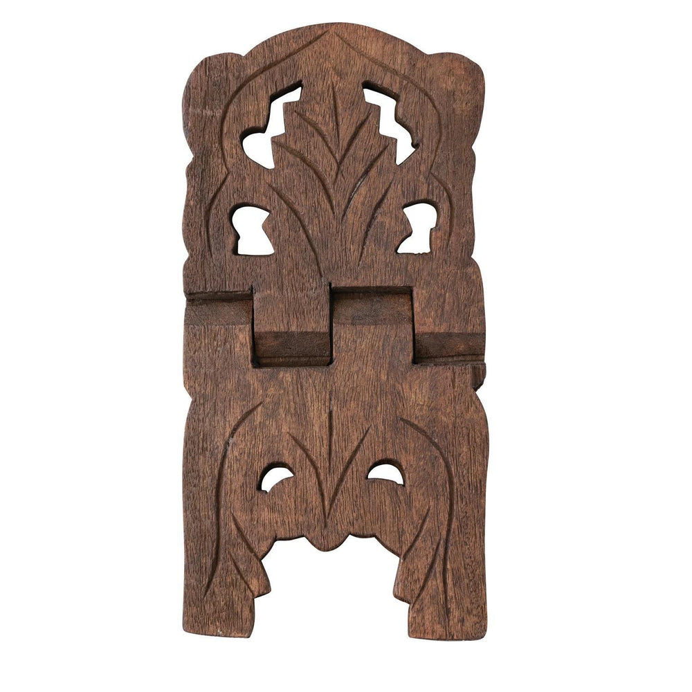 Wooden decorative item with intricate carvings on a white background