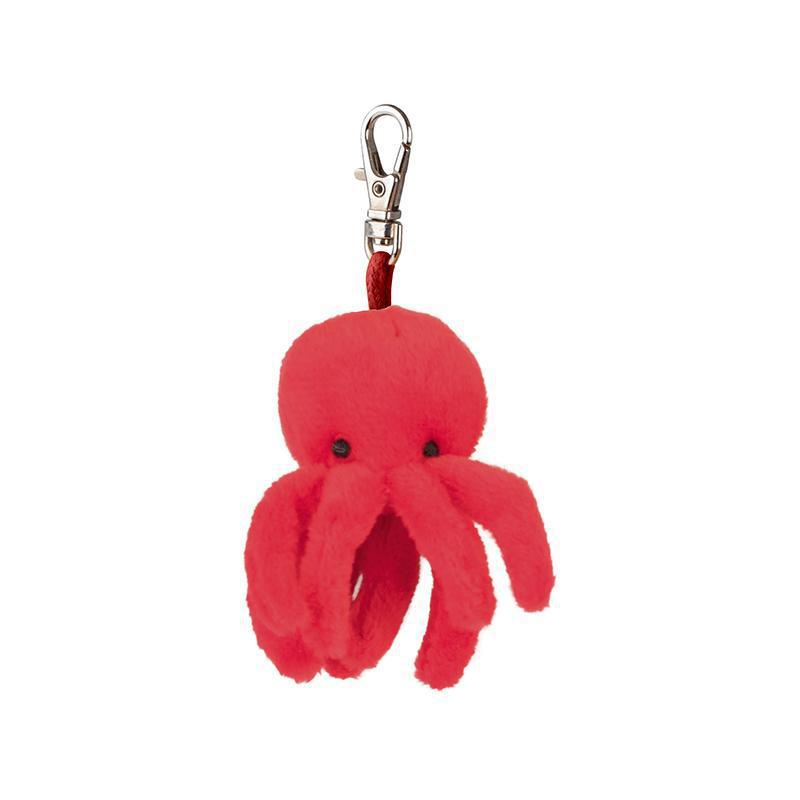 Red octopus keychain with a metal clip on a white background