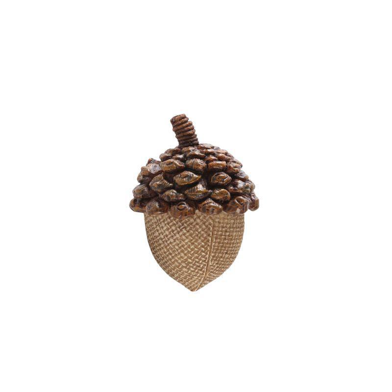 Decorative acorn with pine cone on a white background