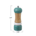 Teal and wooden pepper grinder with measurements on a white background