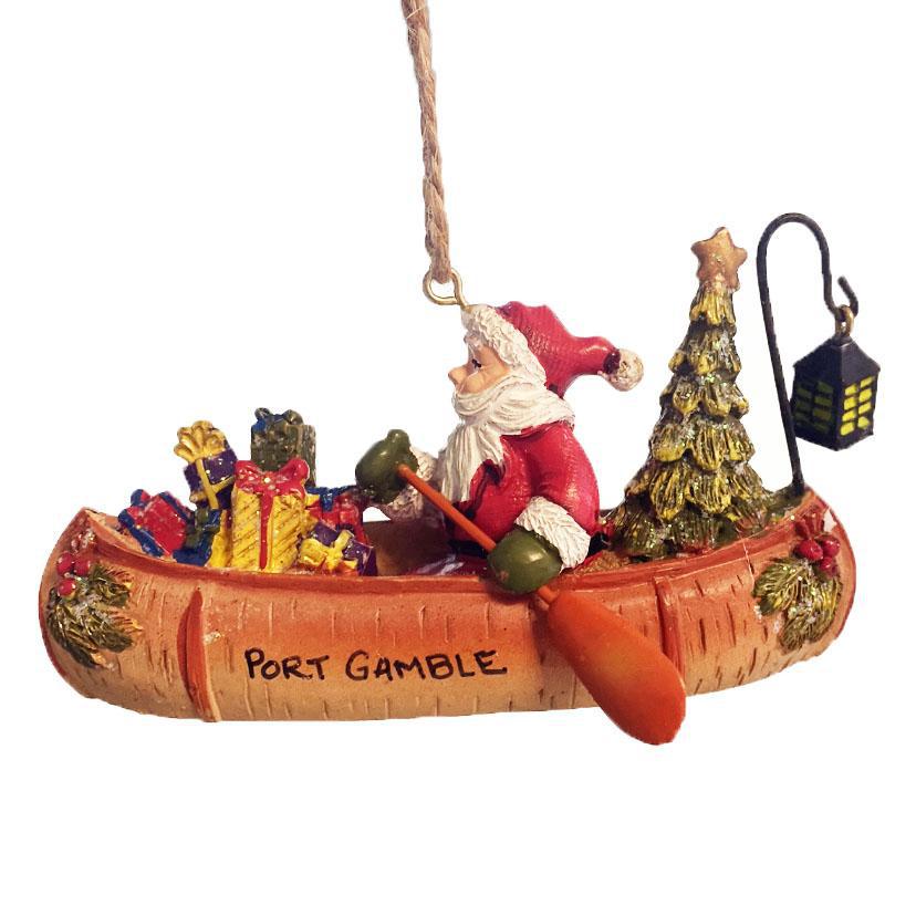Santa in Birch Canoe Christmas Ornament carrying gifts.
