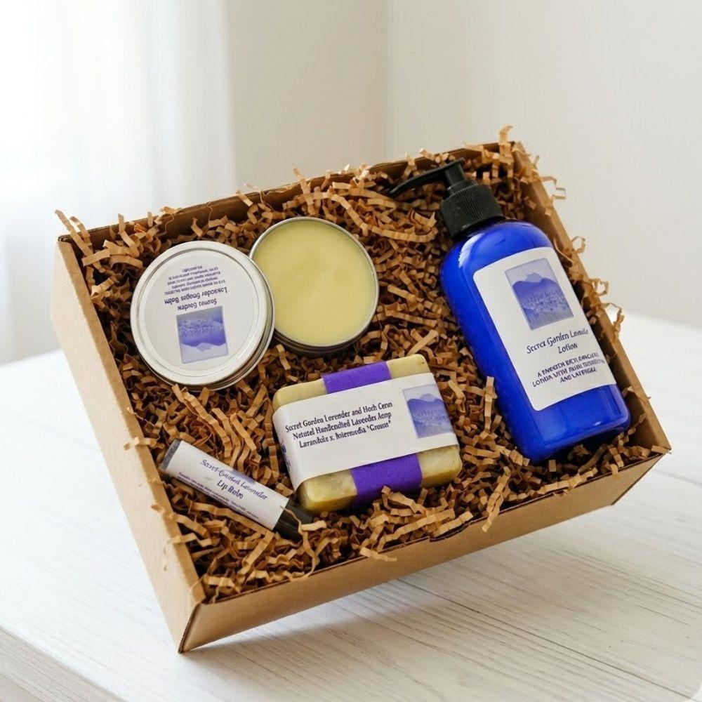 Set of natural skincare products in a box with a white background