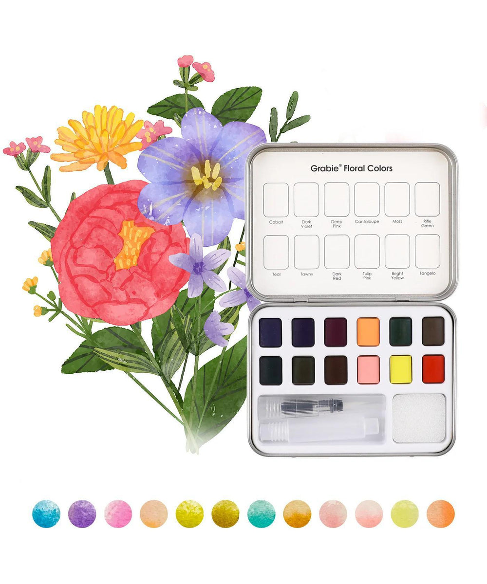Set of watercolor paints with a floral design on a white background