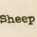 Text 'Sheep' embroidered on a beige fabric background