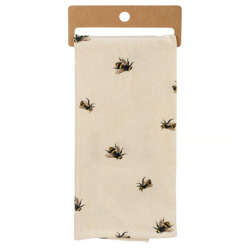 Beige towel with bee pattern on a cardboard backing