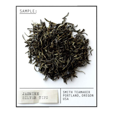 Jasmine silver tips tea leaves with 'Smith Teamaker' branding on a white background