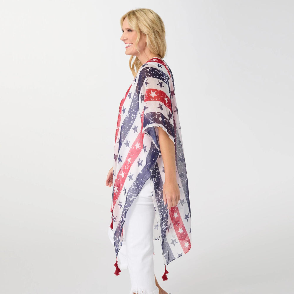 Woman wearing a red, white, and blue patterned kimono against a white background