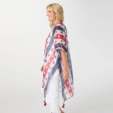 Woman wearing a red, white, and blue patterned kimono against a white background