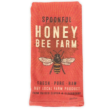 Red package of Spoonful Honey Bee Farm honey with a bee illustration on a white background