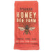 Red package of Spoonful Honey Bee Farm honey with a bee illustration on a white background