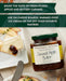 Jar of Stonewall Kitchen Caramel Apple Butter with a plate of food and text about its uses.