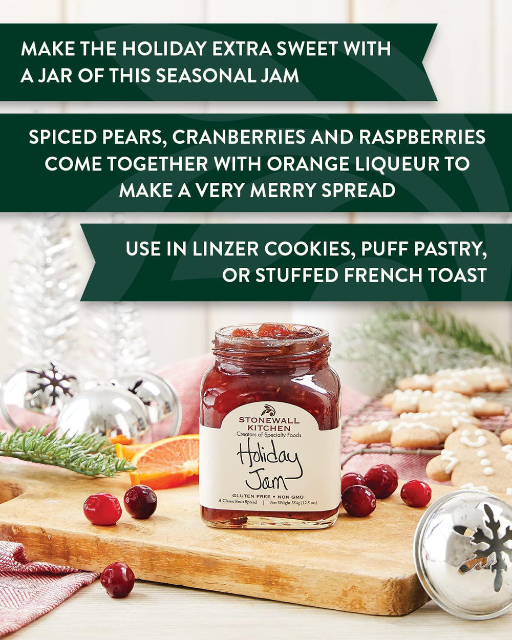 Stonewall Kitchen Holiday Jam jar on a wooden cutting board with Christmas decorations.