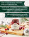 Stonewall Kitchen Holiday Jam jar on a wooden cutting board with Christmas decorations.