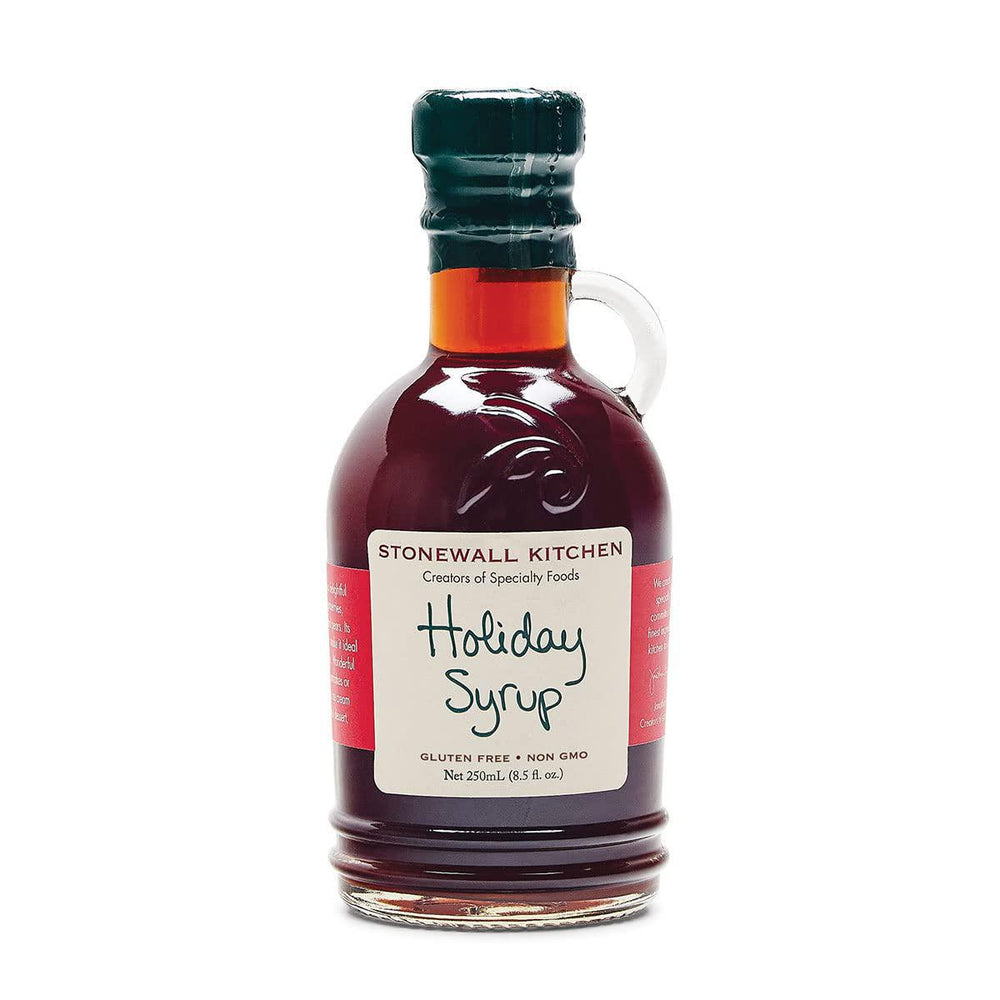 Bottle of Stonewall Kitchen Holiday Syrup on a white background