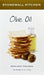 Stonewall Kitchen olive oil with crackers and olives on a white background
