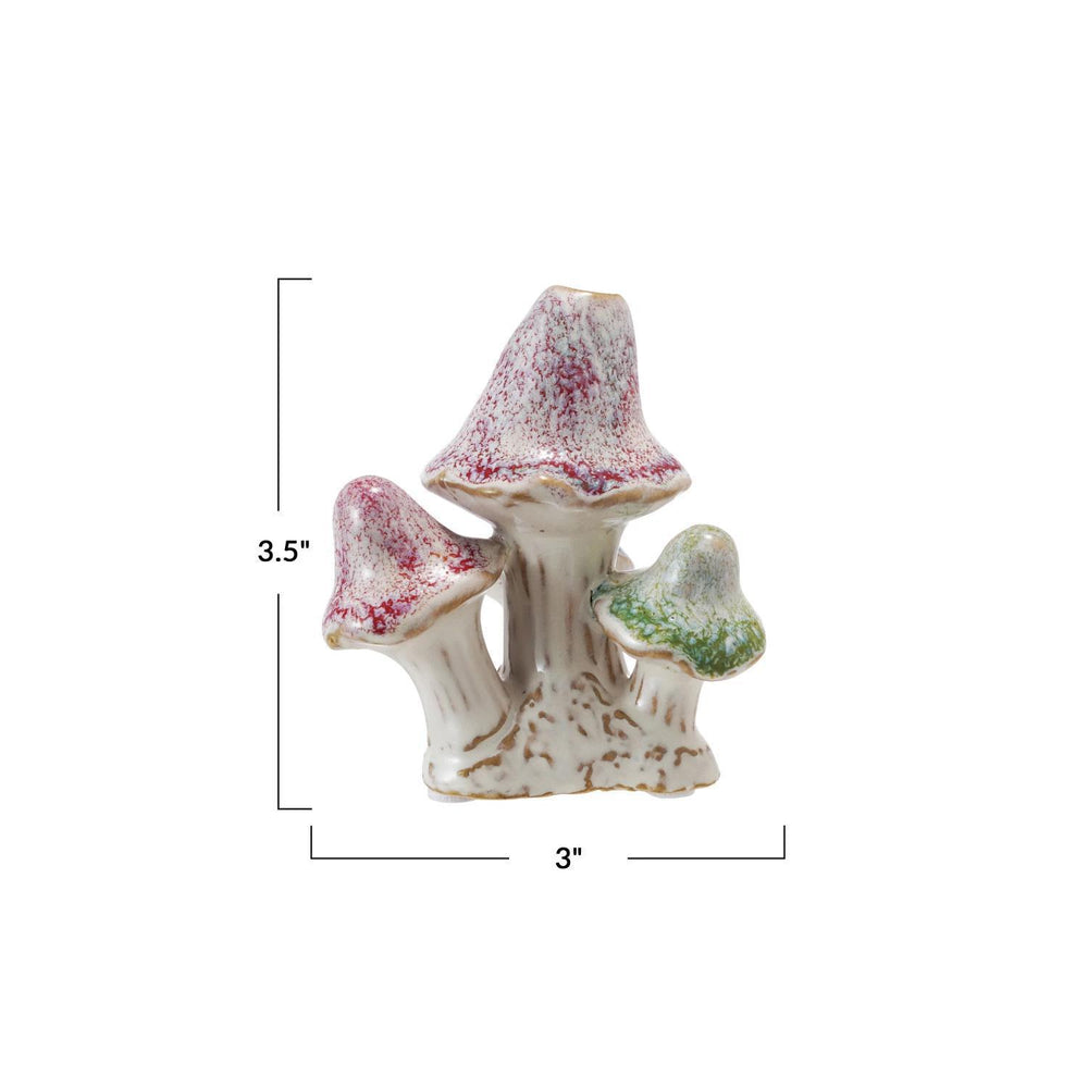 Decorative mushroom sculpture with measurements on a white background