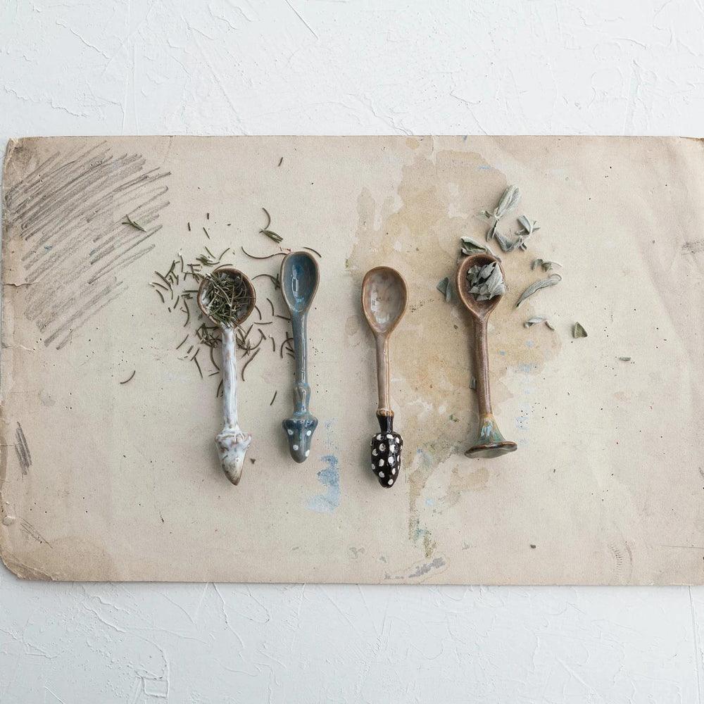 Set of vintage spoons on a textured surface