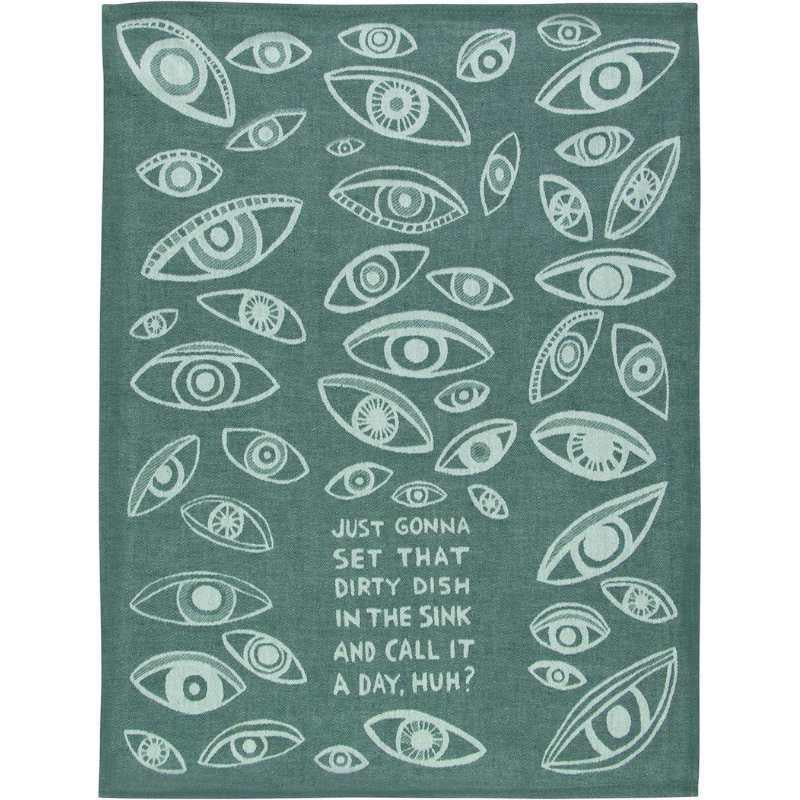 Teal towel with white eye pattern and humorous text on a white background
