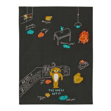 Black towel with colorful illustrations of a kitchen scene and a dog, featuring text and various kitchen items.
