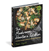 Cookbook titled 'The Mushroom Hunter's Kitchen' with a dish of mushrooms and greens on the cover.
