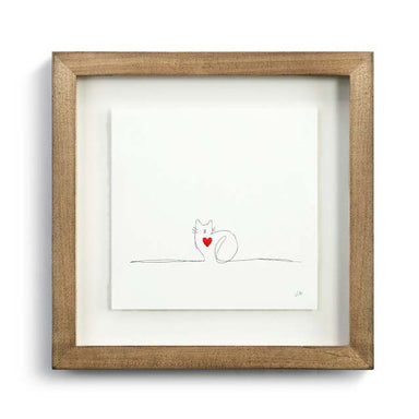 Wooden frame showing the drawing of a cat with a red heart. 