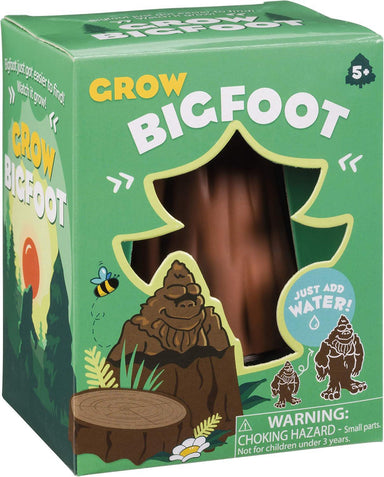 Grow Bigfoot toy packaging with green background and cartoon characters.