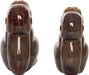 Two brown ceramic dog-shaped salt and pepper shakers on a white background