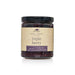 Jar of triple berry jam with a kraft paper label on a white background