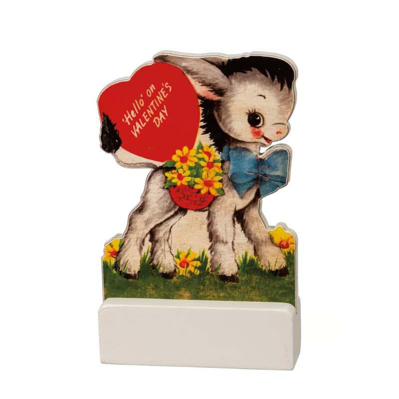 Vintage-style card with a dog holding a heart-shaped Valentine's Day card on a white background