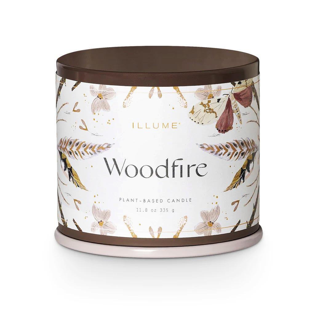 TIn candle wooffire scent with stylish touch with their full wrap label on textured stock,