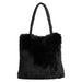 A black faux fur tote bag with thick braided shoulder straps, shown against a plain light gray background.