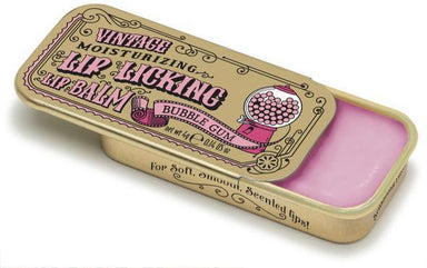 Vintage-style lip balm with gold tin and pink lip balm on a white background