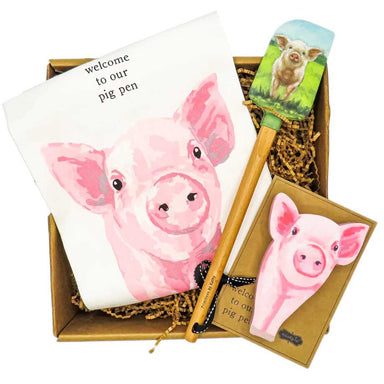 cute pink piglet themed box set containing a cotton towel a spatula and a dish sponge
