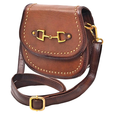 Brown leather bag with gold hardware on a white background