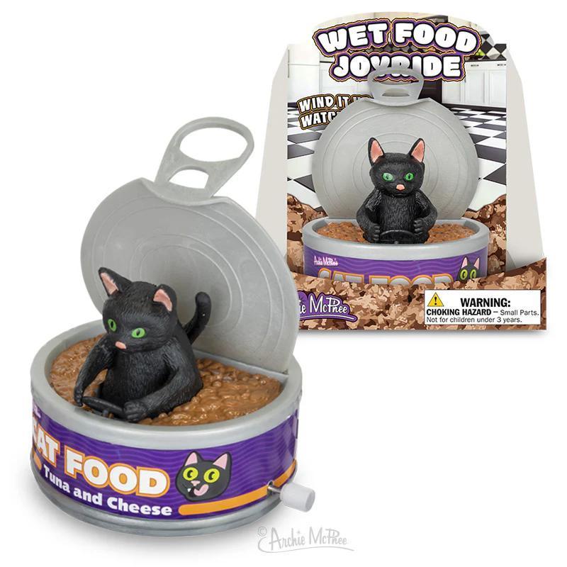 Cat-shaped toy with 'Wet Food Journde' packaging featuring a black cat figure.