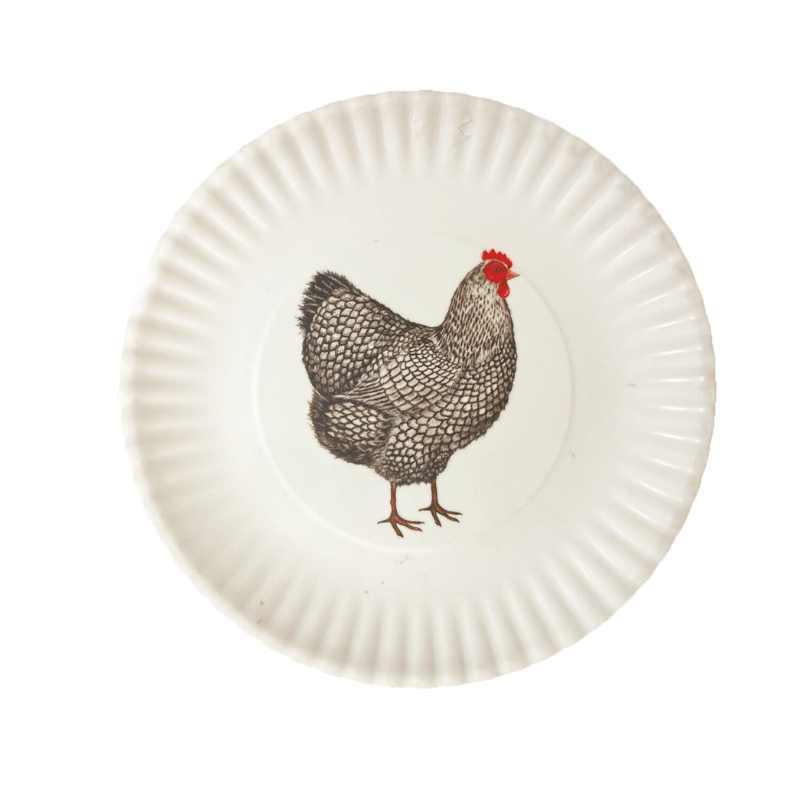 White plate with a chicken illustration on a white background