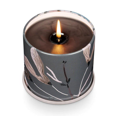 Woodfire tin candle interior pattern, metallic details, and color rolled edge to match the colored wax. 