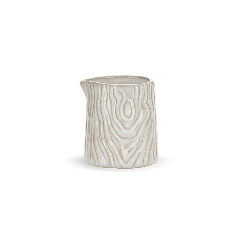 Ceramic vase with wood grain pattern on a white background