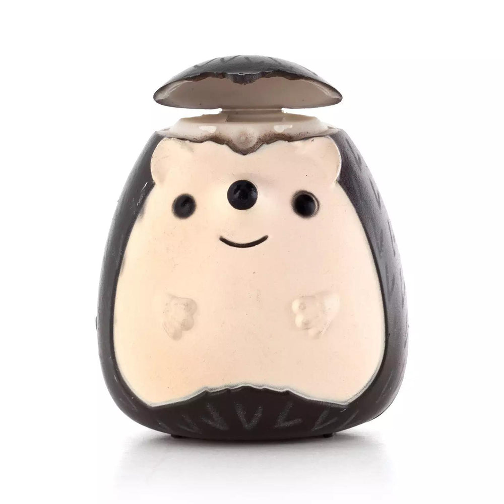 Toy mushroom with a smiling face on a white background