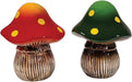 Two ceramic mushrooms with colorful caps on a white background