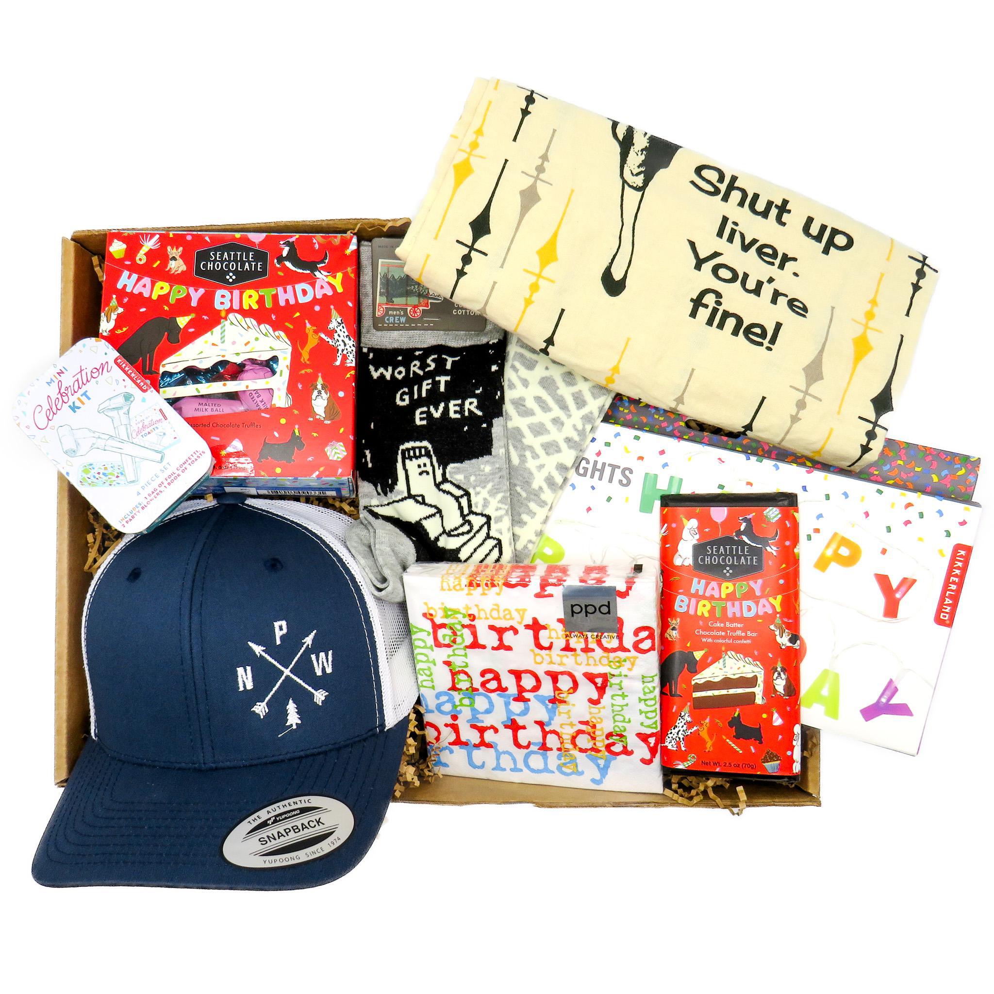 Birthday gift set for him: Includes a stylish cap, mini celebration kit, box of chocolates, quirky pair of socks, a humorous towel, a chocolate bar, happy birthday napkins and happy birthday string lights. 
