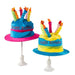Two colorful birthday cake hats with candles on a white background