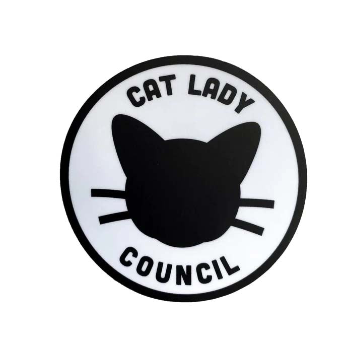 "Cat lady Council" black and white round sticker showing the illustration of a kitty's face.  