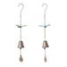 Two hanging bell decorations with dragonfly charms on a white background