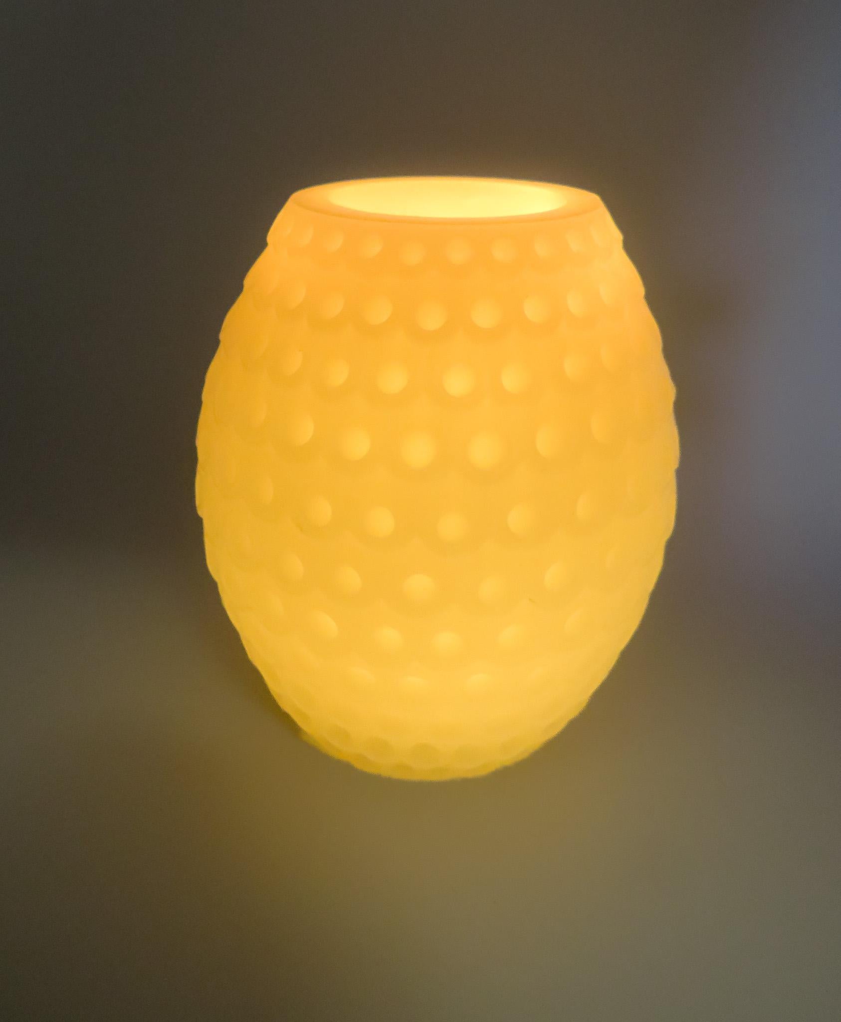 glowing and beautiful flameless candle made of wax and feature an embossed design LED Light