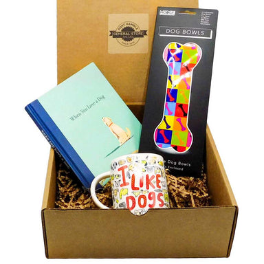 great gift set for people that love dogs that includes a compact collapsible travel dog bowls, a book and a mug.